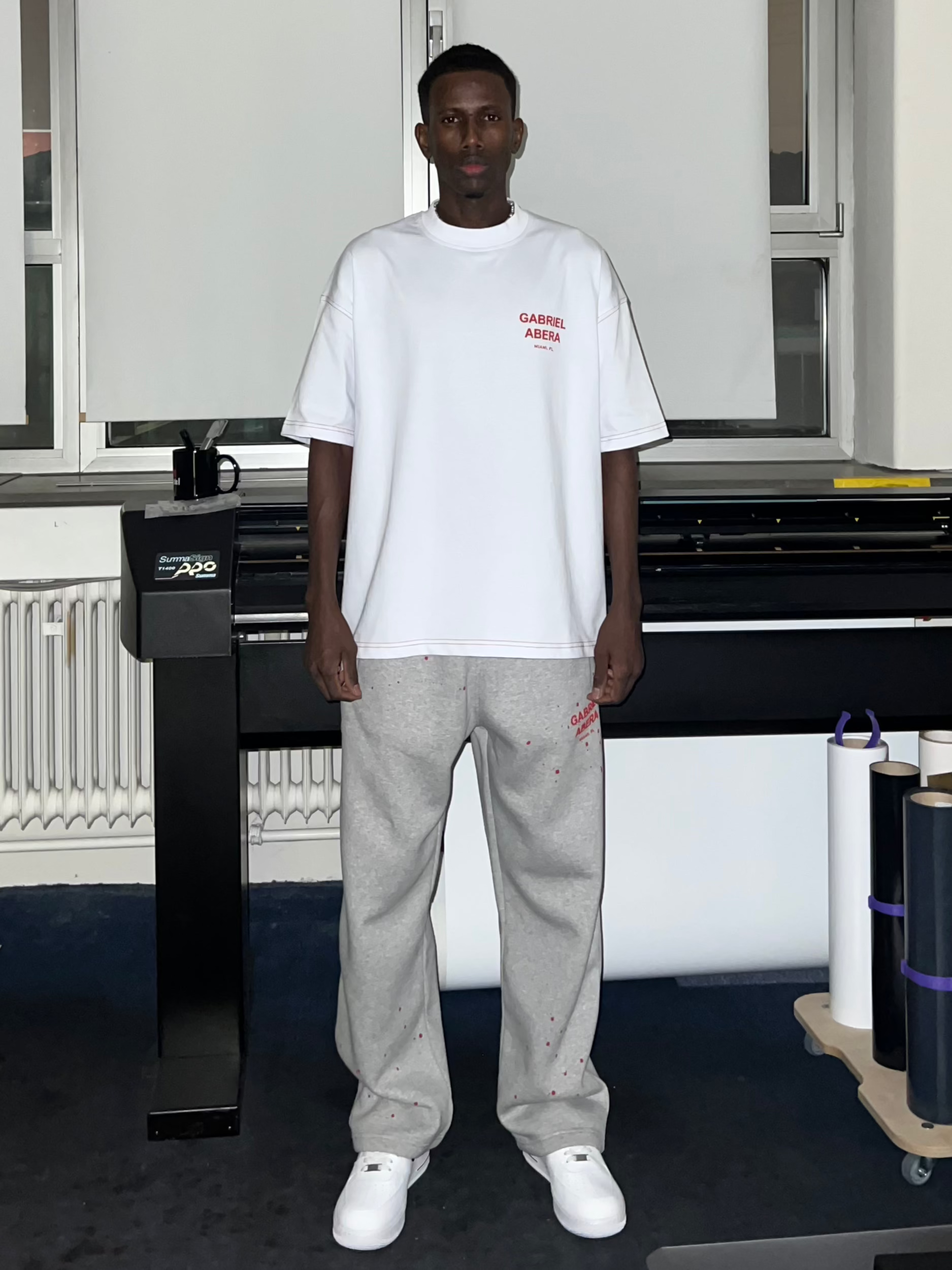 Front view of Black Logo Puff T-Shirt with bold puff print on chest, oversized cropped fit, and minimalist streetwear design.