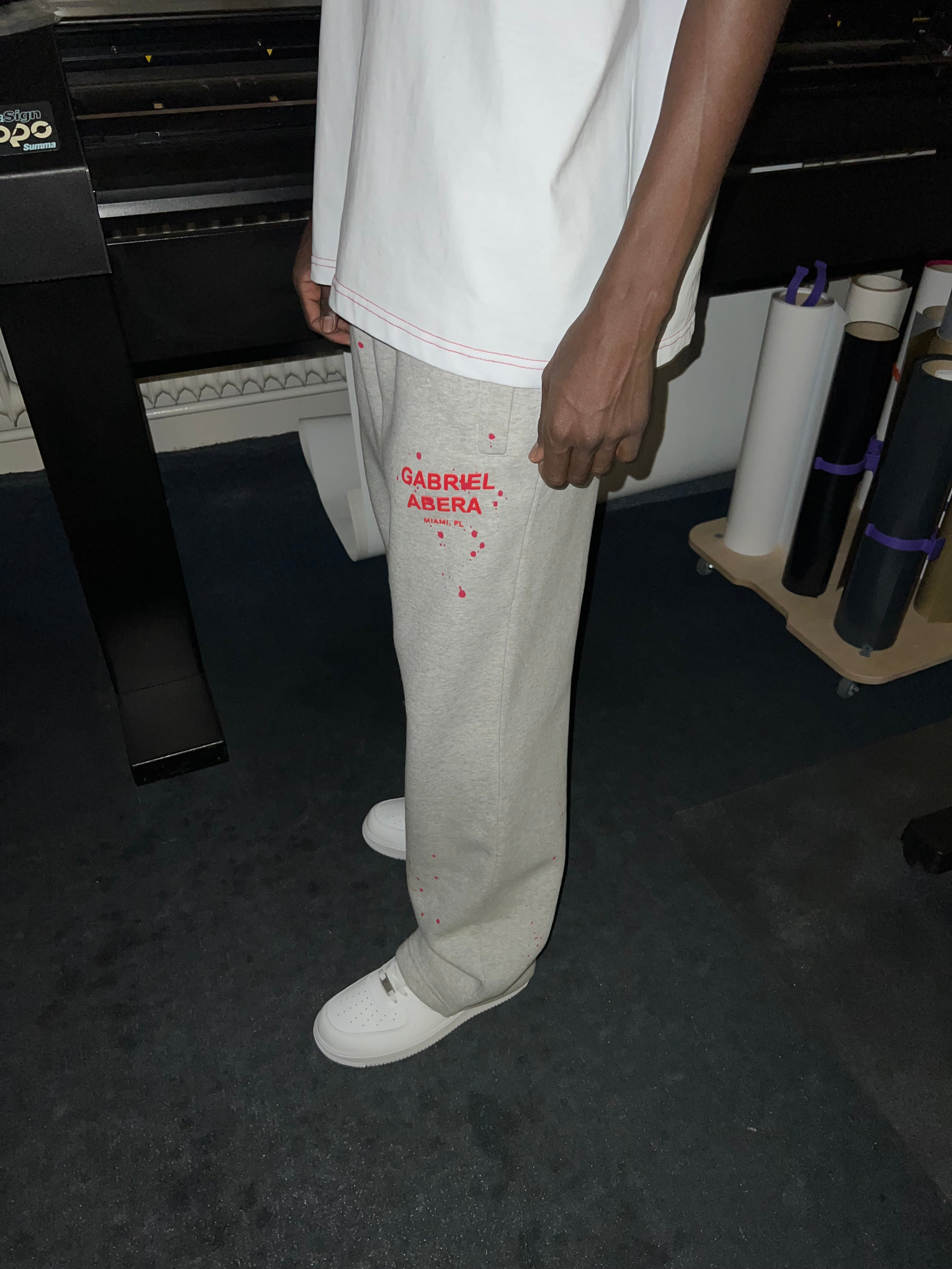 Close up Side view of Splattered Sweatpants in Grey with baggy streetwear silhouette and premium design.